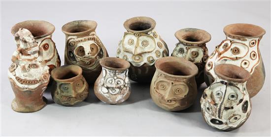 Ten assorted Aibom Village clay storage jars etc